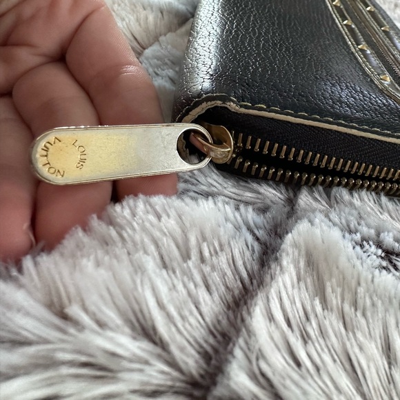 Authentic Louis Vuitton Suhali Zippy Long
Wallet black- excellent condit… - Picture 12 of 13